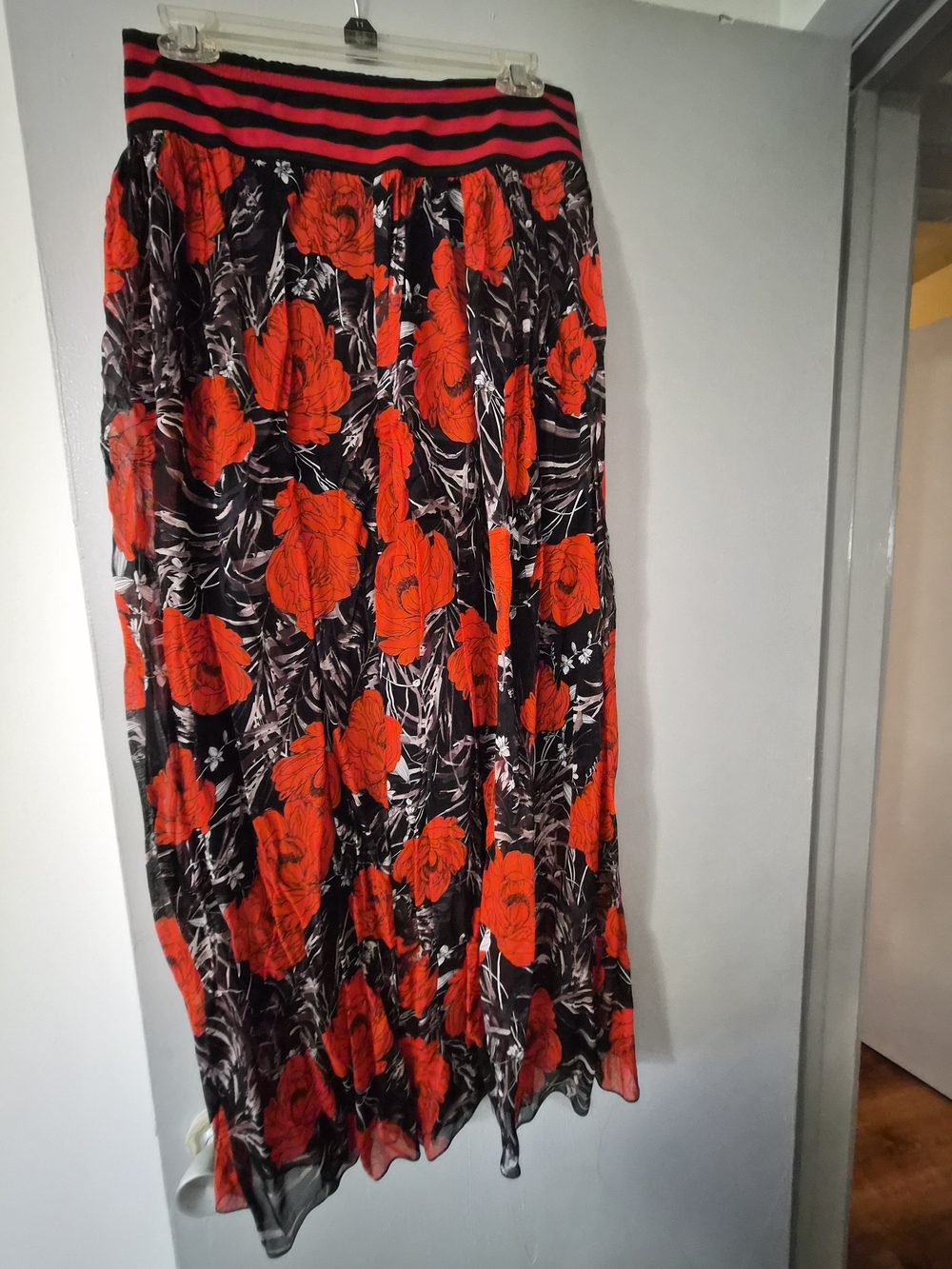 Black Maxi Skirt with Vibrant Red Floral Print and Striped Waistband